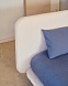 Кровать Odum со съемным чехлом из бежевого микробукле и ножками из массива бука 180 x 200 см